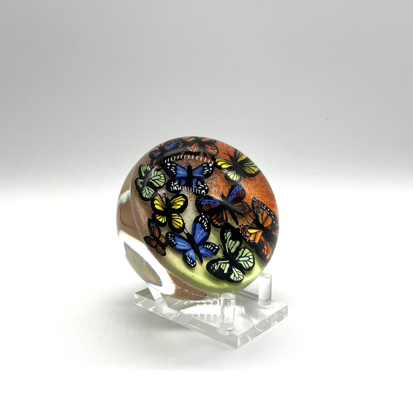 Butterfly Cloud on Orange & Yellow Paperweight 2024 by Cathy Richardson